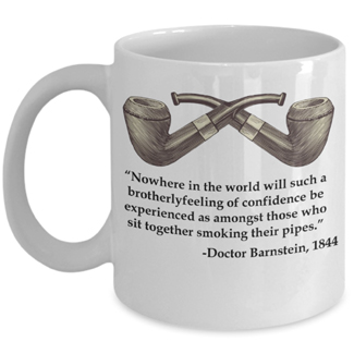 Ceramic coffee mug with a vintage tobacco pipe illustration and a quote from Doctor Barnstein Nowhere in the world will such a brotherly feeling of confidence be experienced as amongst those who sit together smoking their pipes.