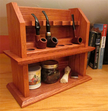 Front view of a Craftsman Cottage smoking pipe rack made from woodworking plans.