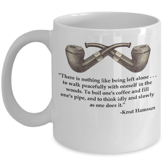 Ceramic coffee mug with a vintage tobacco pipe illustration and a quote from Knut Hamsun There is nothing like being left alone . . . to walk peacefully with oneself in the woods. To boil one's coffee and fill one's pipe, and to think idly and slowly as one does it.