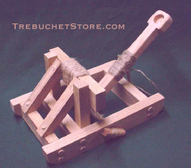 Front view of a model Roman mangonel catapult in the cocked postion