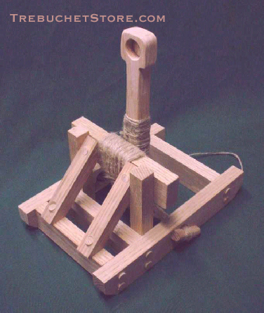 Front view of a model Roman mangonel catapult in the fired postion