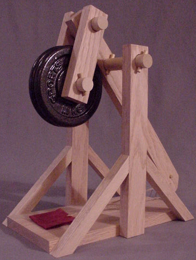 Front left side view of a working model trebuchet, made from plans, in the cocked position