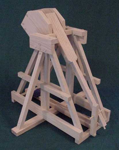 Back view of plans for how to build a trebuchet showing the trebuchet in the cocked position