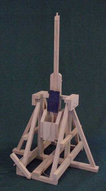 Trebuchet in the fired position showing the cabinet, beam and sling