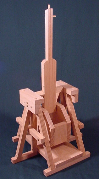 da Vinci Trebuchet in the fired postion showing the throwing arm, sling and counterweight cabinet