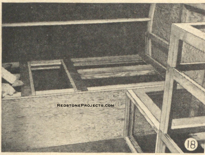 Fig. 18. Close-up of partly finished daveno bed with facing panel in place. Also shows part of the framing for galley.
