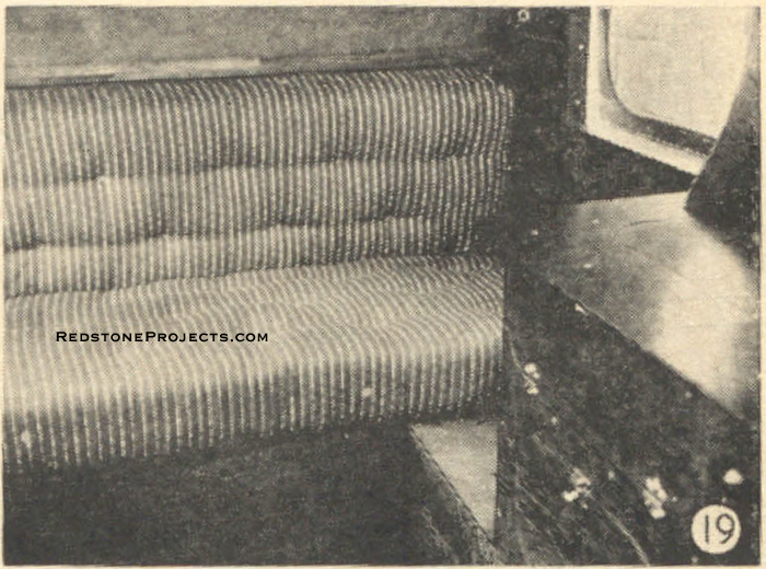 Fig. 19. Completed daveno bed with cushions arranged for day use as a davenport. Also shows corner of galley worktable.