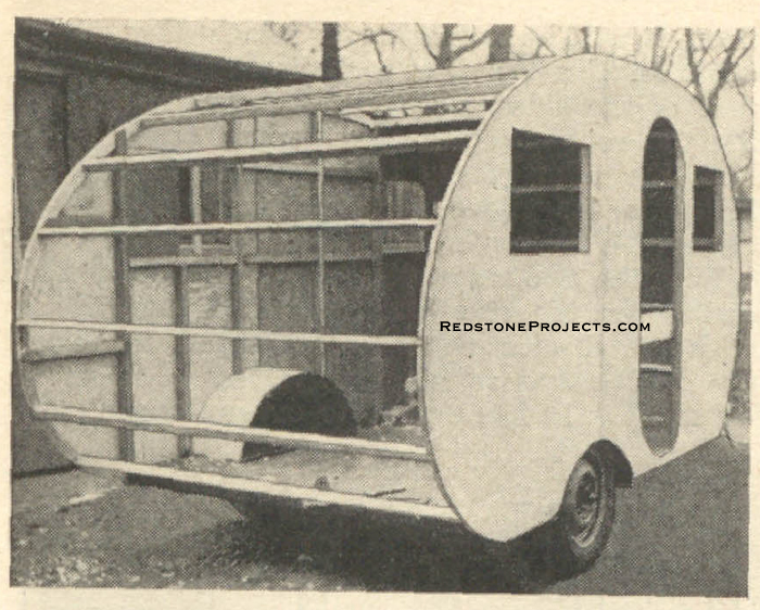 Fig. 13. Rear view of trailer body before attaching roof. Note arrangement of roof beams. Every third beam is 1 5/8 square to receive both edges of joints.