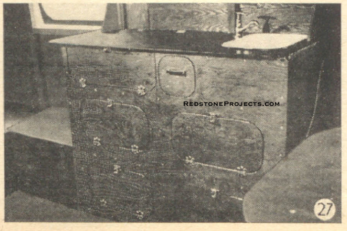 Fig. 27. Close-up of galley and cabinets. Note generous space for all galley equipment, food and staples, also ice box for perishables.