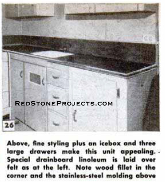 Completed kitchen with icebox in a vintage travel trailer.
