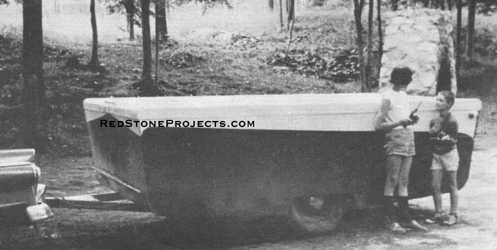 The Maxwell’s trailer is shown in its folded position, ready for towing. In the position, the lower half of trailer door opens, a handy feature for roadside stops.