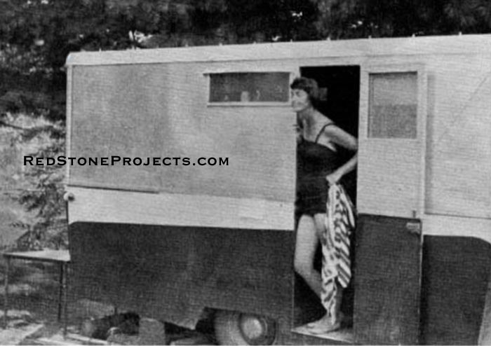 At camp, the folding sides are raised to make a full-sized trailer with double bed and bunks to sleep three more. It was built in a home workshop using plans published here.