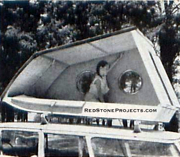 FINAL ERECTION step is swinging up sidewalls and securing with four wing nuts on inside. Note hinged spacer strip that swings outward at rear of sleeper