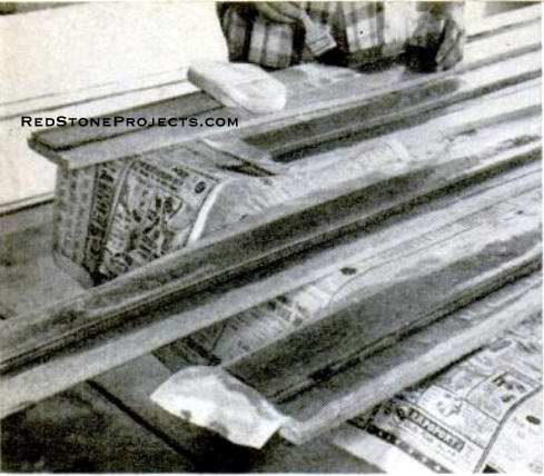 Plywood strips reinforce side and end panels.Fasten 3/8-inch thick strips to inside faces of foam (flush with base edge) using resin; cover with 6-inch cloth tape, more resin.