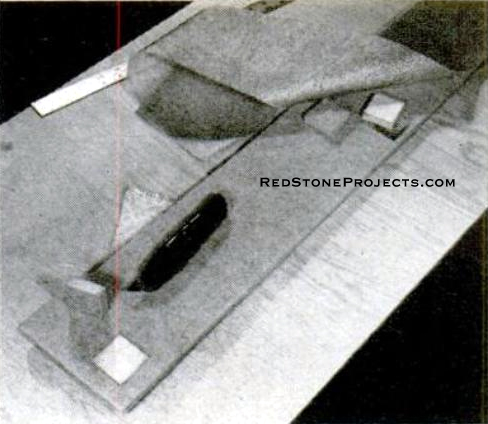 Reinforce foam where support-tube bearings and latches attach. Cut away 2-inch squares, glue in 1/2-inch plywood inserts to keep foam compressing under force.