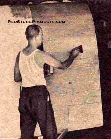 After applying coat of plastic to half of  the top, lay on Fiberglass cloth. pull out all the wrinkles.