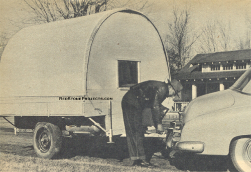 Hitching up the modern Conestoga style camping trailer.