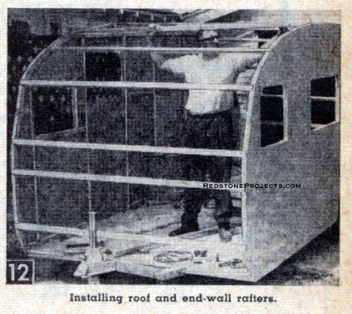 Installing the trailer roof roof and end-wall rafters.