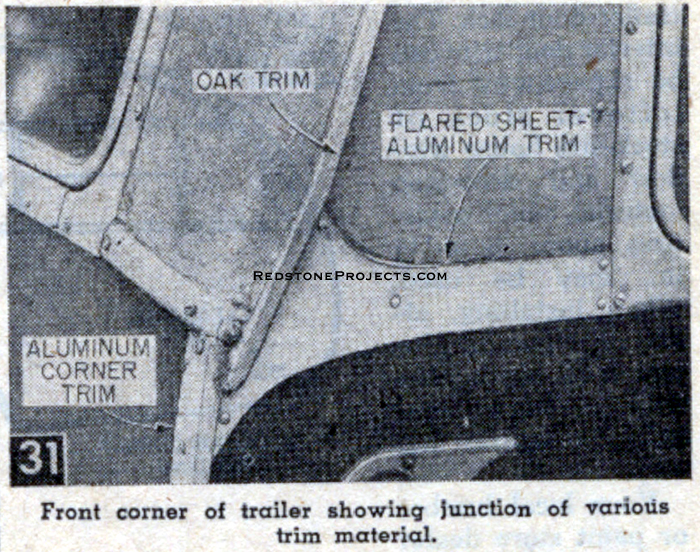 Front corner of trailer showing junction of various trim materials.