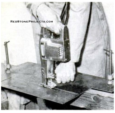 Metal cutting saw make short work of a tough job: Cutting the 14-ga steel tabletop. If you lack this tool, a sheet metal shop can do the work for you.