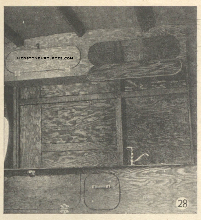 Fig. 28. Extra locker space can be added above galley, in the corner of the roof, if desired.