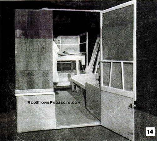 Two piece folding door for a folding camper trailer.