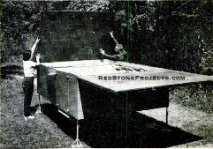 Above, lids of the box, when flung open and supported on the removeable pipe brackets, provide outboard bunks for the two full-size mattresses which stow on the trailer floor.