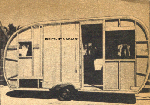 Photo of the right side frame assembly and interior wall of a canned ham trailer.
